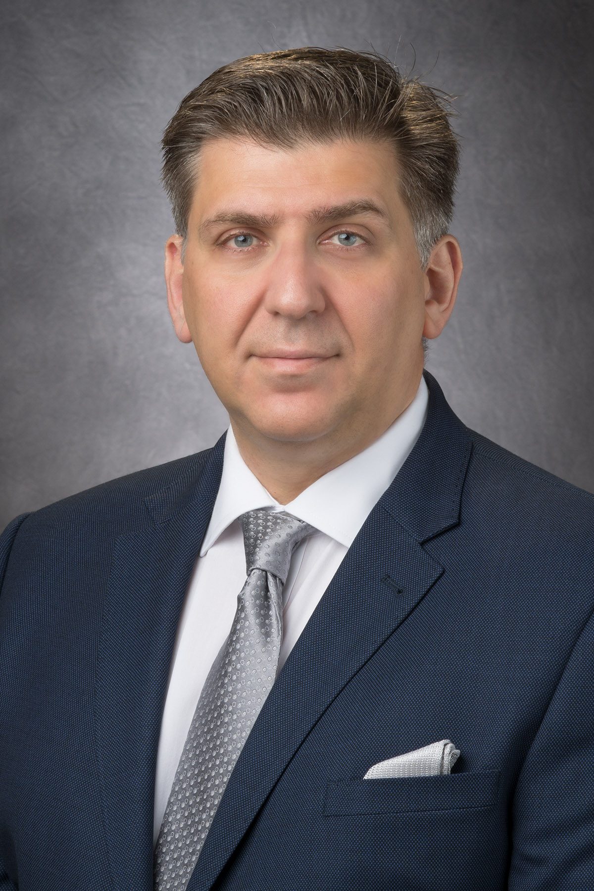 Dr. Johnny Vlahos